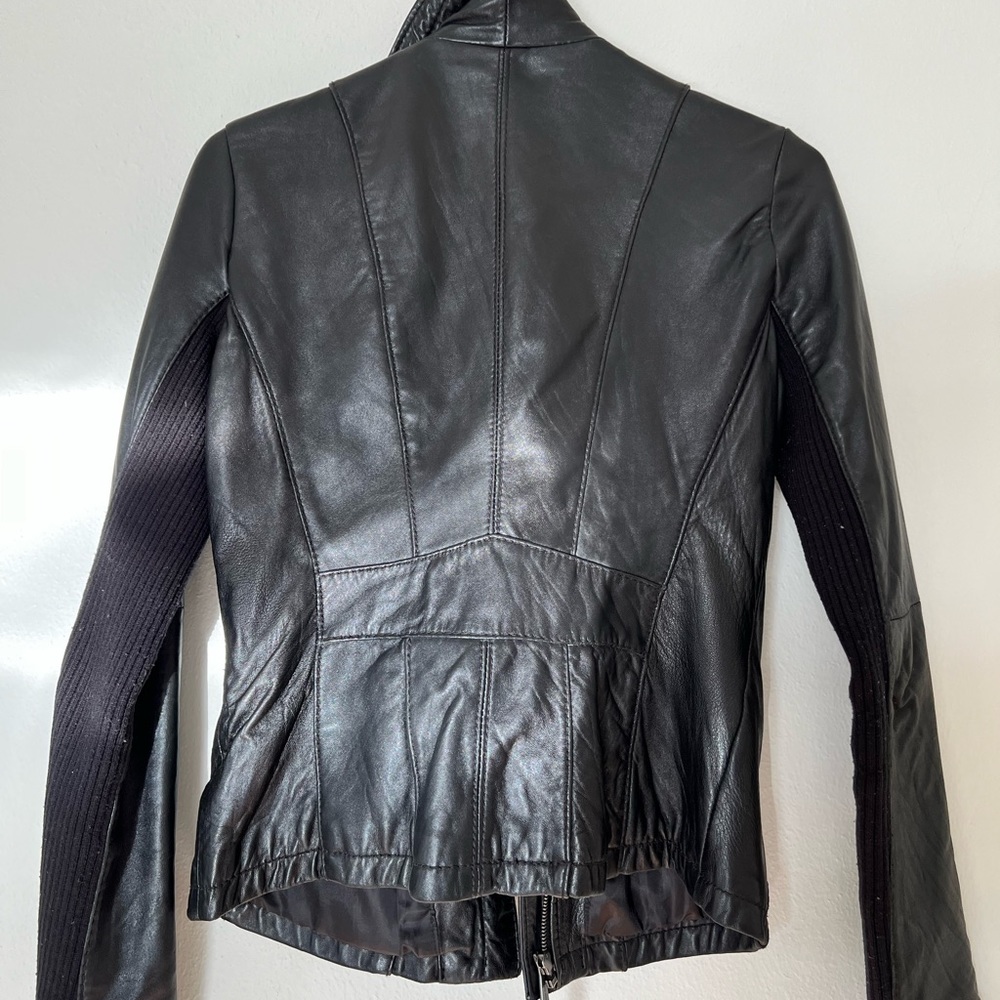 Michael Kors black leather jacket with wool inside the collar and under the arms